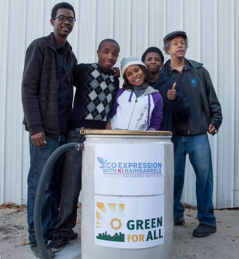 Mat, Rasul, Asli, William, and Imhotep show off an Express Yourself Rainbarrel