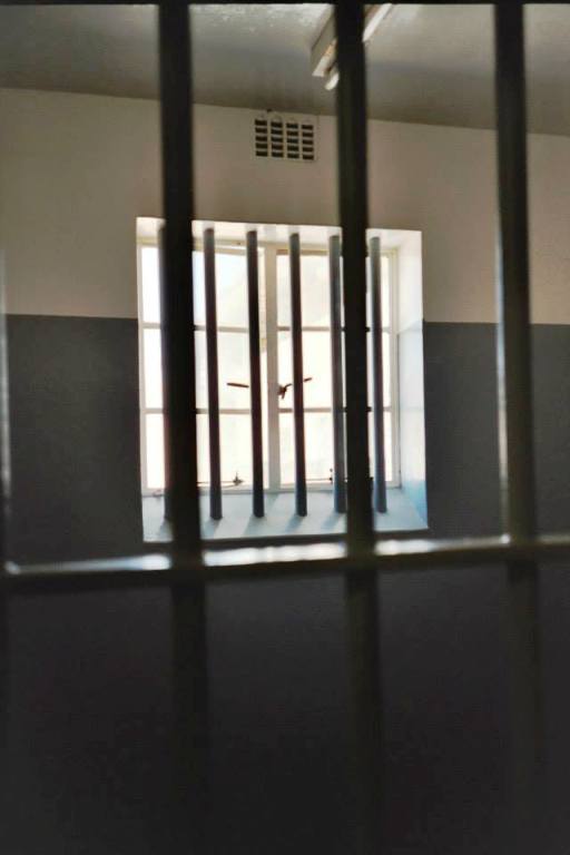 Nelson Mandela's cell. When he stretched out on the floor he could touch both walls.