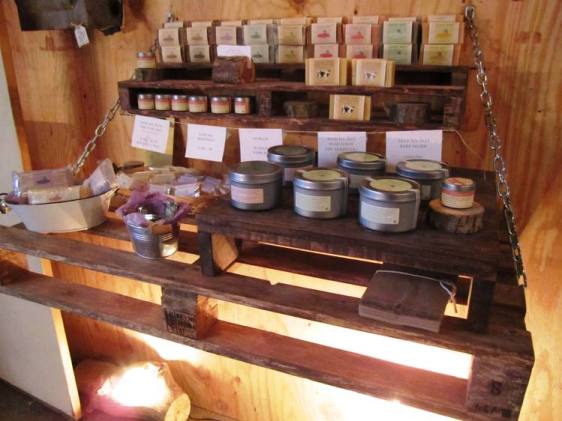 Sculptor Cheryl Lorance makes bathsalts, body butters, and soaps (local Traders Point Creamery milk is a key ingredient!) Displayed here on upcycled pallets.