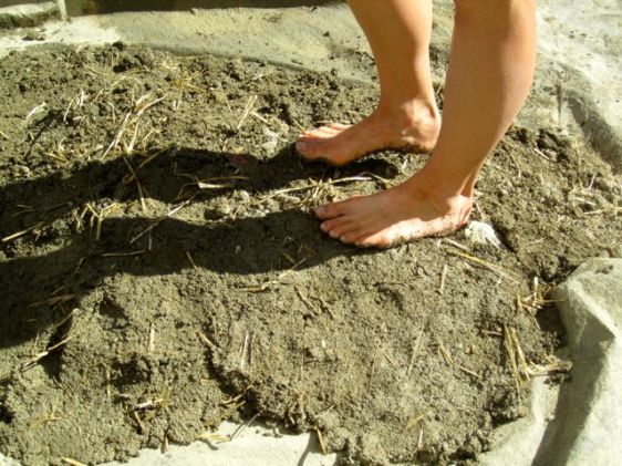 Mixing a batch of cob.