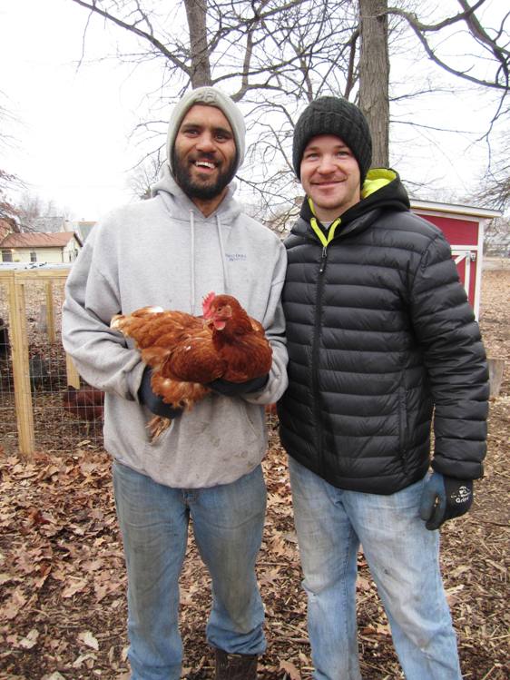 Justin Berg, farm manager, and Mike Higbee, project coordinator, with lady friend